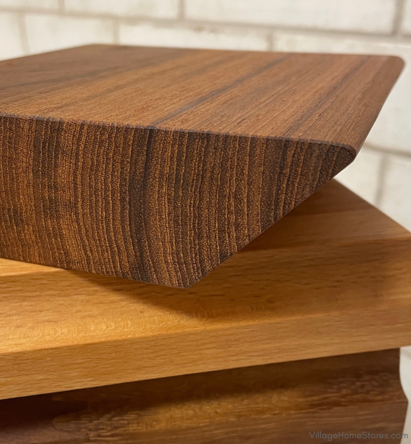 closeup image of wood countertop samples stacked up with knife edge option on top
