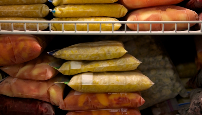 Frozen food in bags in freezer