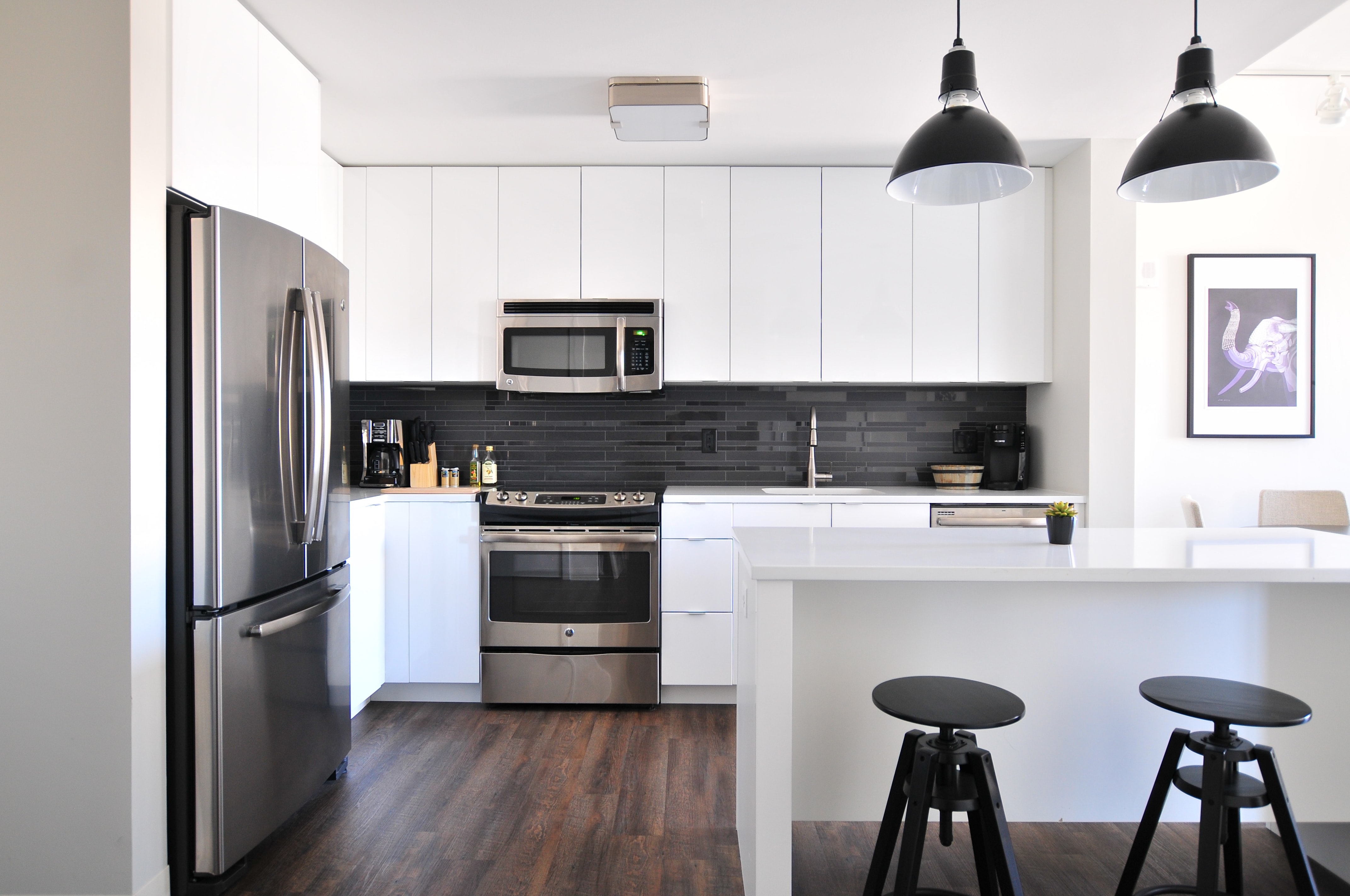 black and white kitchen with French door refrigerator