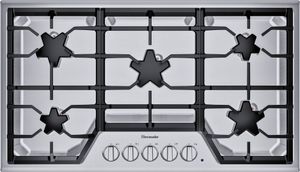 iron grate covering gas cooktop