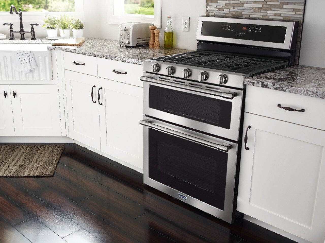 Close up look at a Maytag gas double oven range 