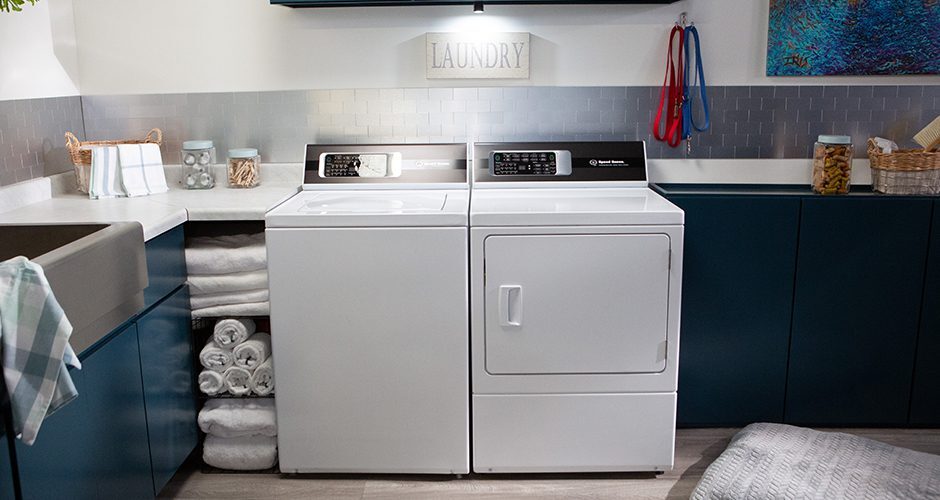 A Speed Queen washer and dryer in a laundry room