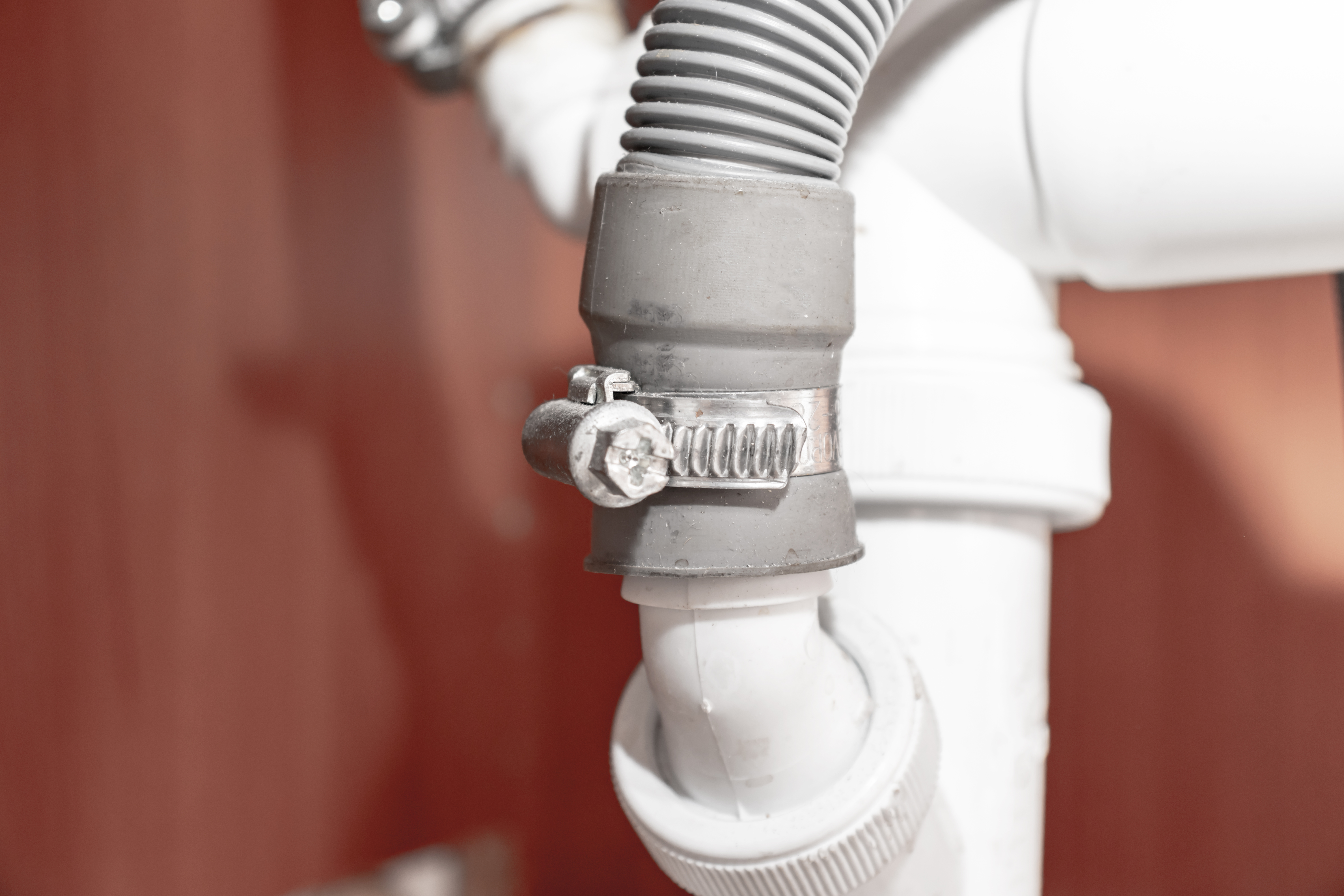 Close up of a dishwasher drain hose
