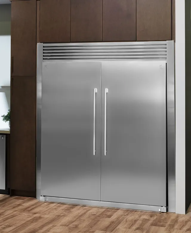 The Electrolux EI33AR80WS freezerless refrigerator with a matching freezer in a kitchen 