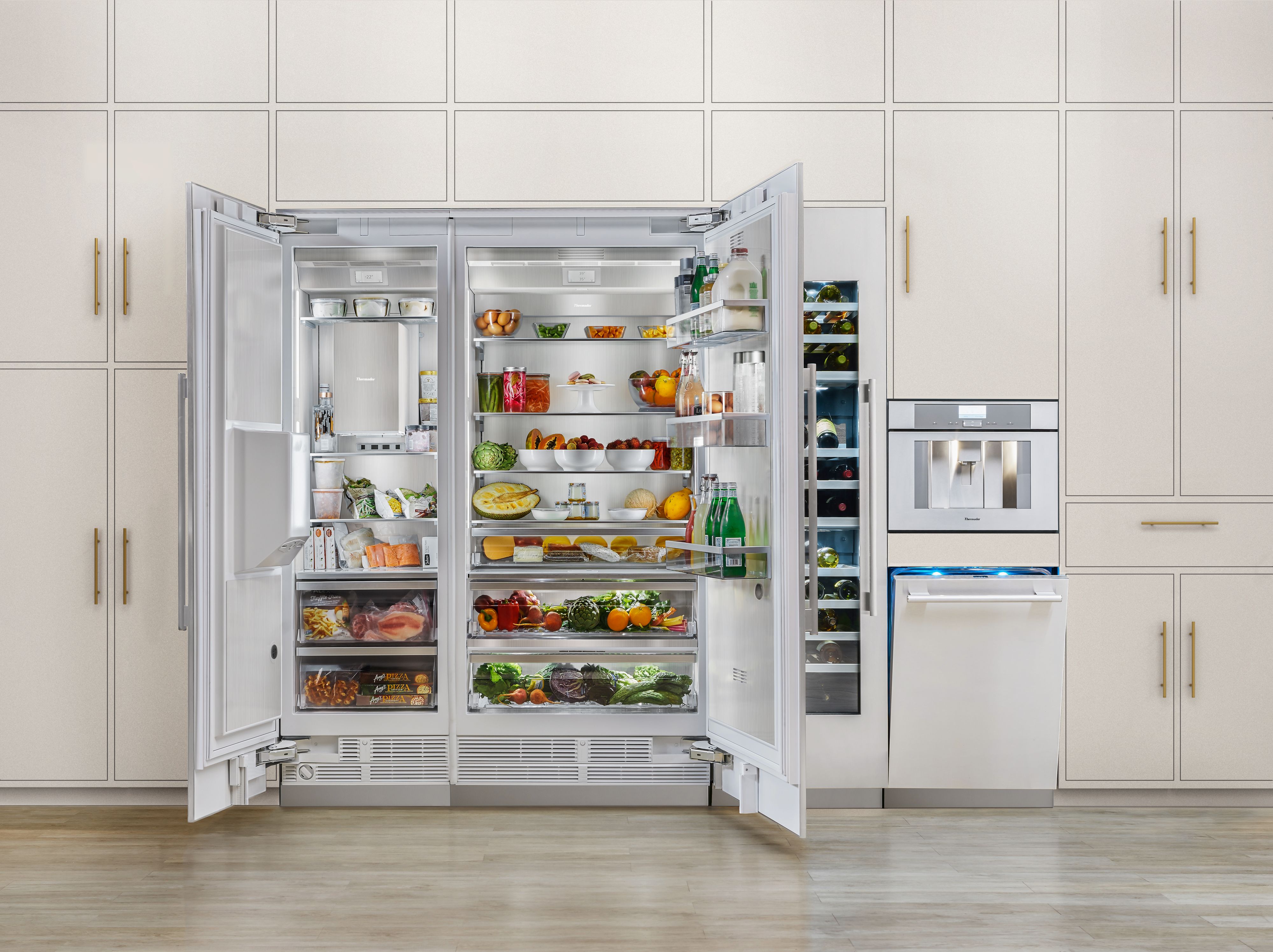 The Thermador T36IR905SP freezerless refrigerator with a matching freezer in a modern kitchen 