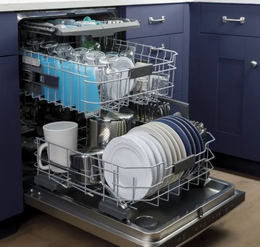 GE dishwasher next to blue cabinetry 