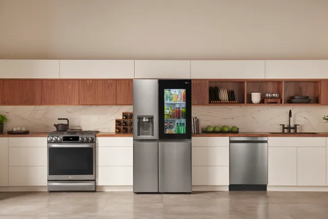 An LG LRSOC2306S French door refrigerator shown in a kitchen 