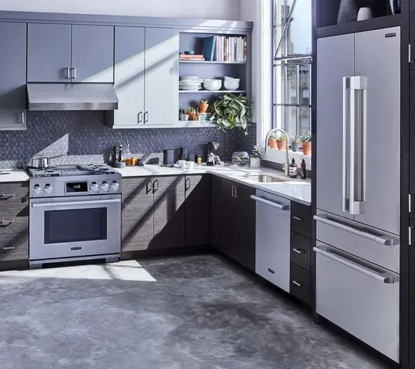 A kitchen featuring Signature Kitchen Suite appliances 