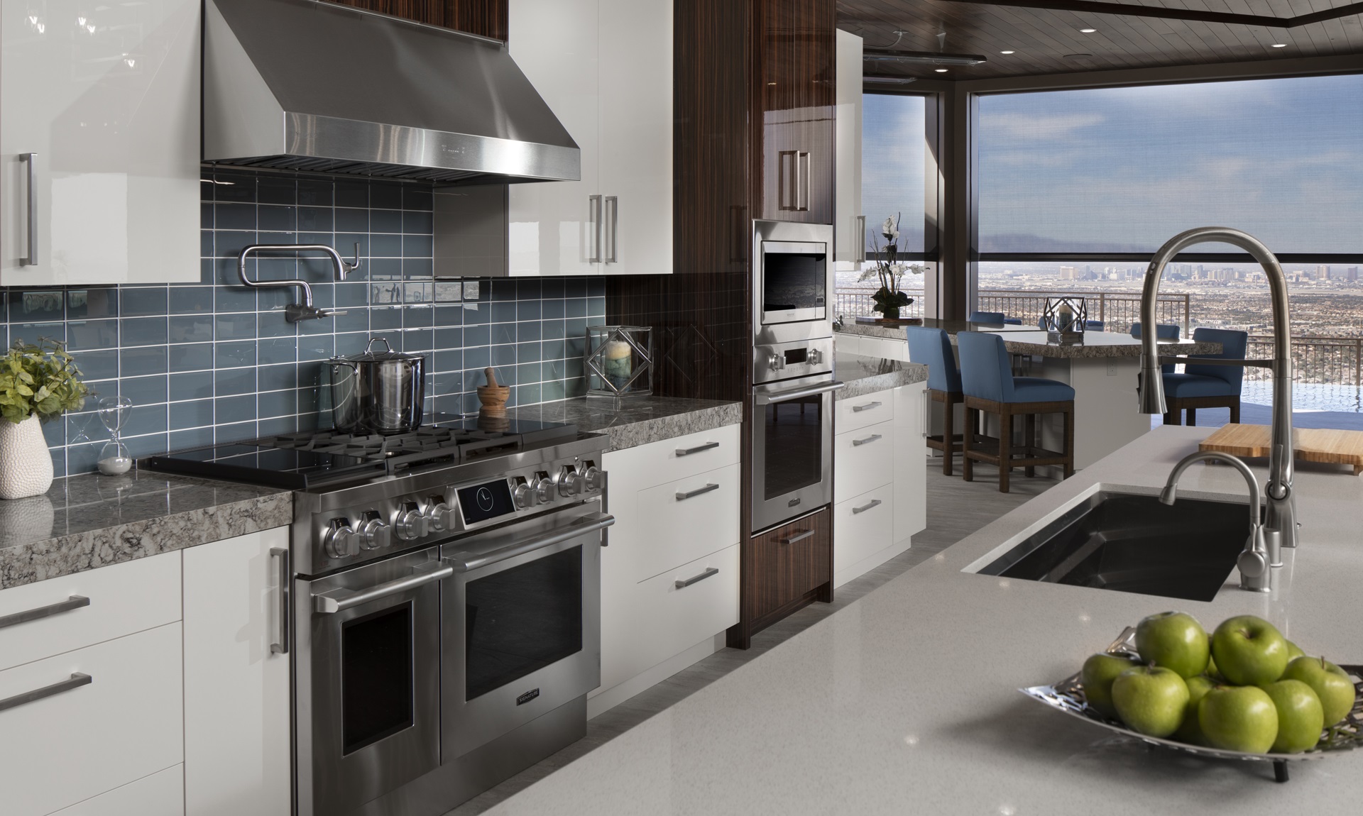 A modern kitchen featuring stainless steel Signature Kitchen Suite appliances 