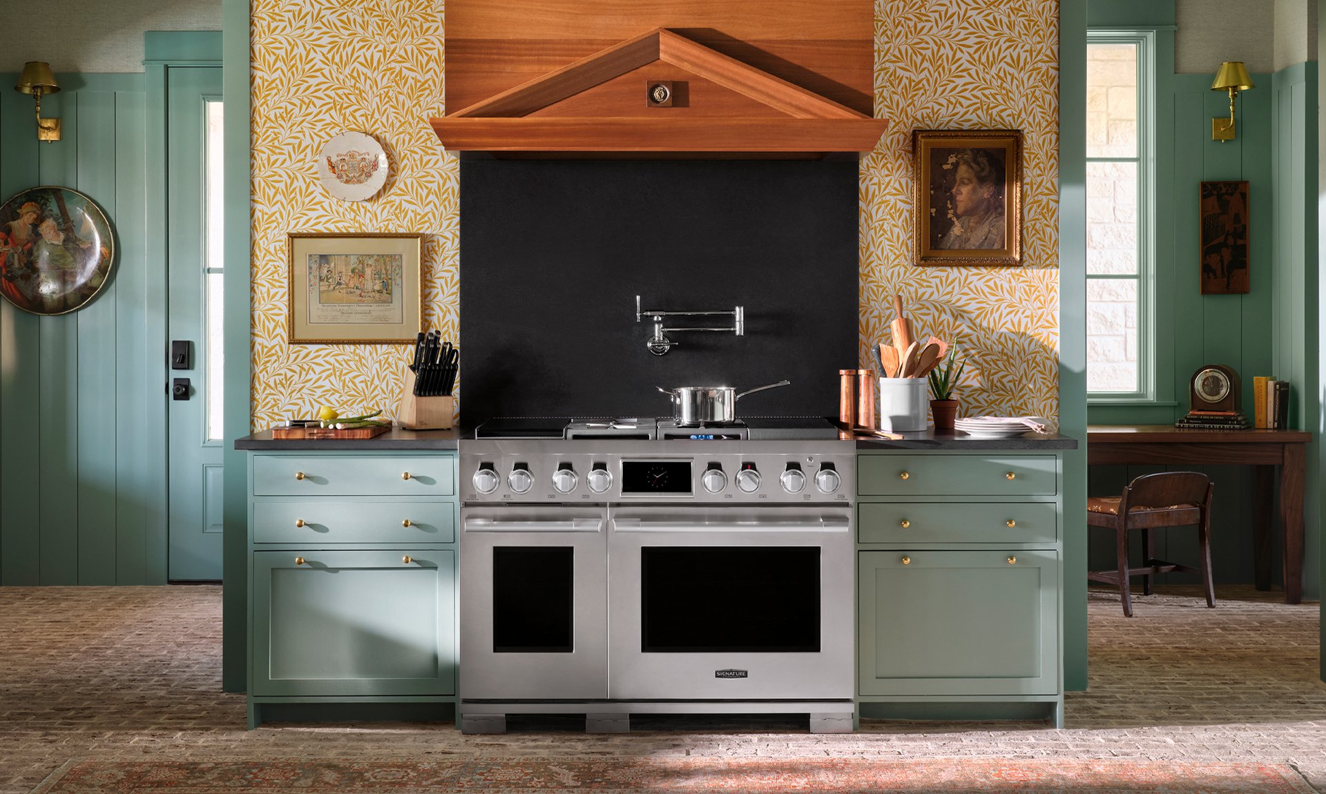 A designer kitchen featuring a Signature Kitchen Suite 48” pro-style range 