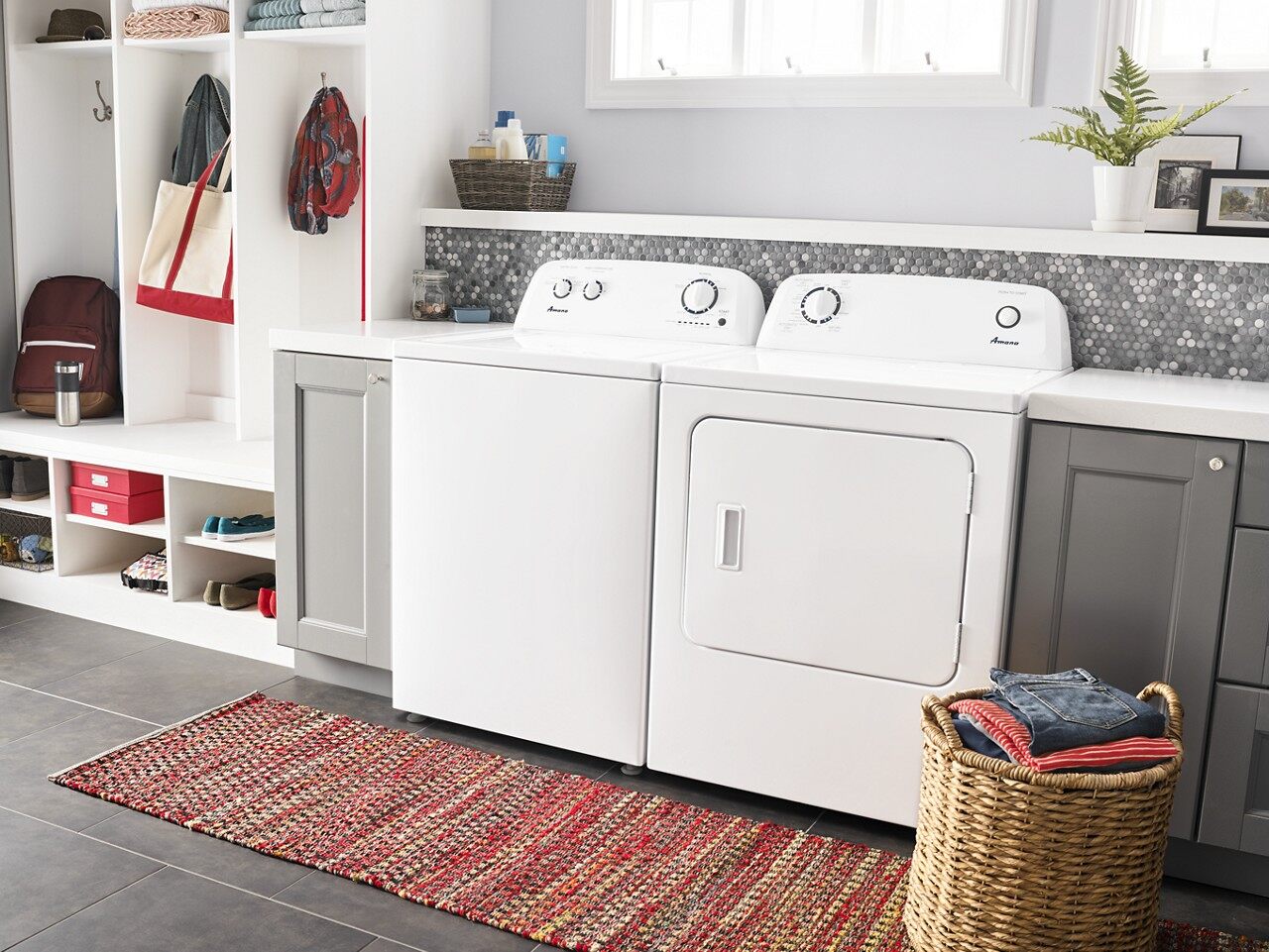 Lifestyle shot of Amana top load washer and matching dryer 