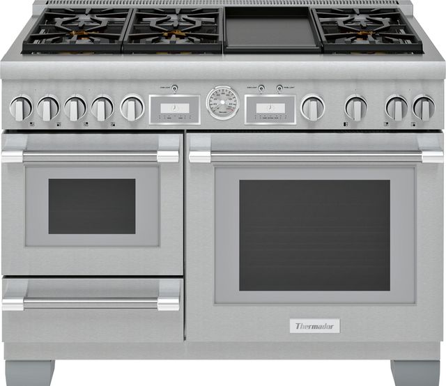 Stock photo of a stainless steel Thermador brand 48-inch range with two ovens and extra drawer. 