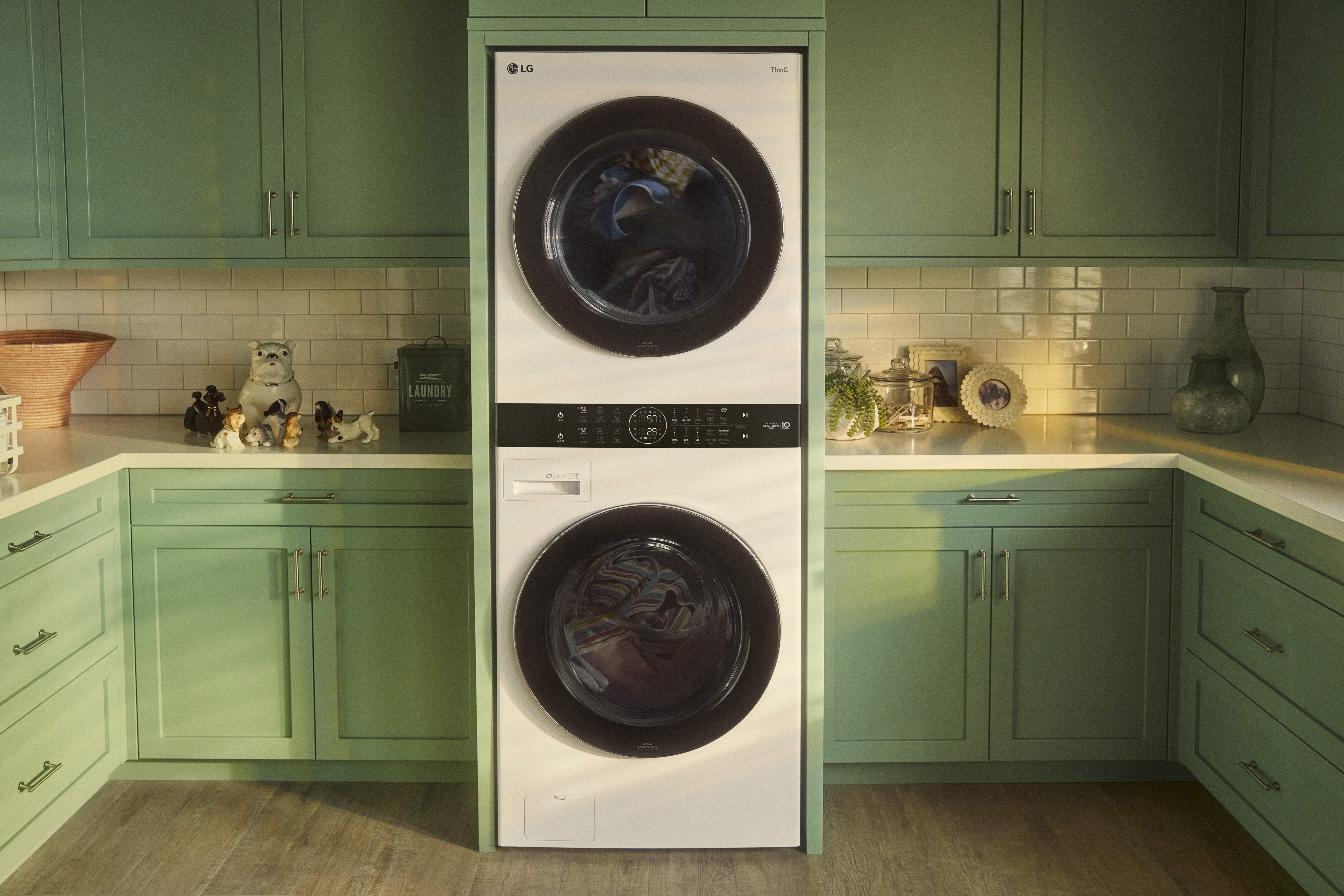 LG WKEX200HWA WashTower installed in green themed laundry room