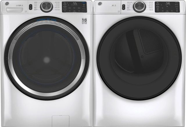 Stock photo of a white GE brand stackable washer and dryer next to each other.