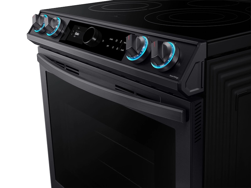 Samsung product image of blue illuminated control knobs on black stainless steel NE63T8711SG front-control slide-in electric range