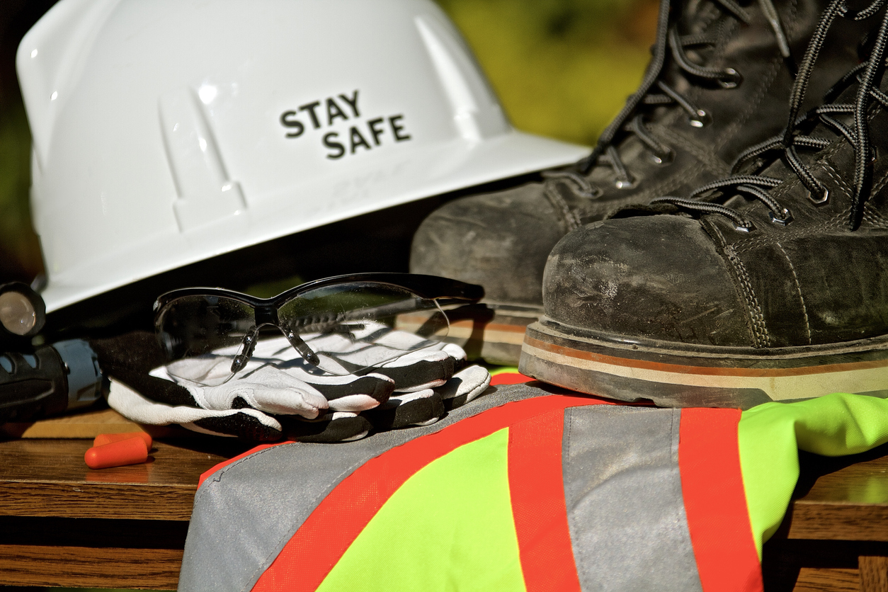 personal protection equipment including hardhat, gloves, protective glasses