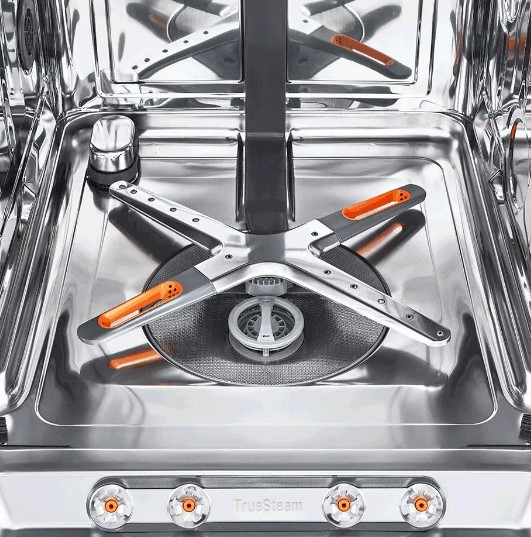 Interior of an LG dishwasher featuring TrueSteam technology