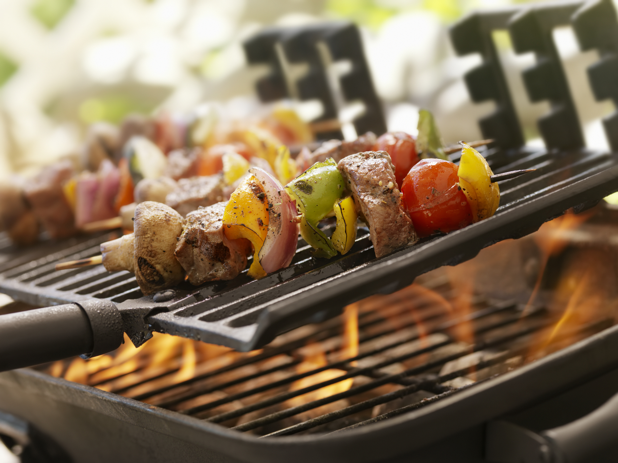 grill with chicken and veggie kebobs 