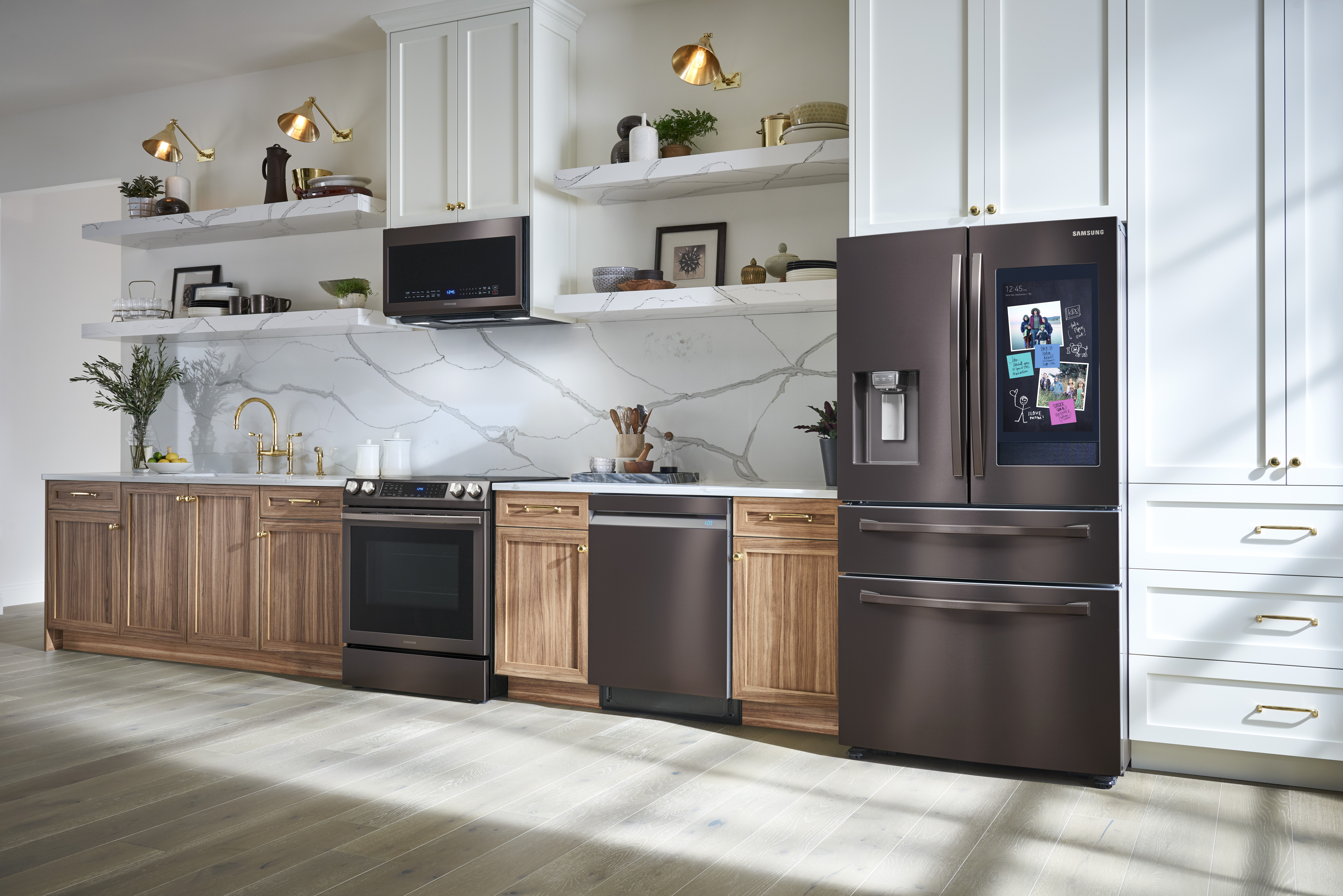 Tuscan stainless-steel kitchen appliance package in sunlit kitchen