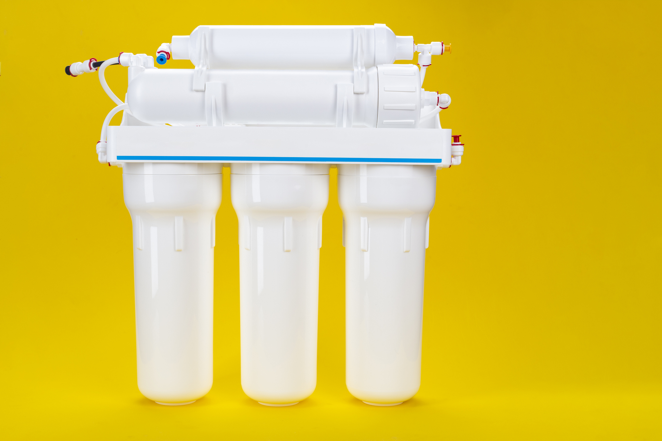 reverse osmosis system on a yellow background