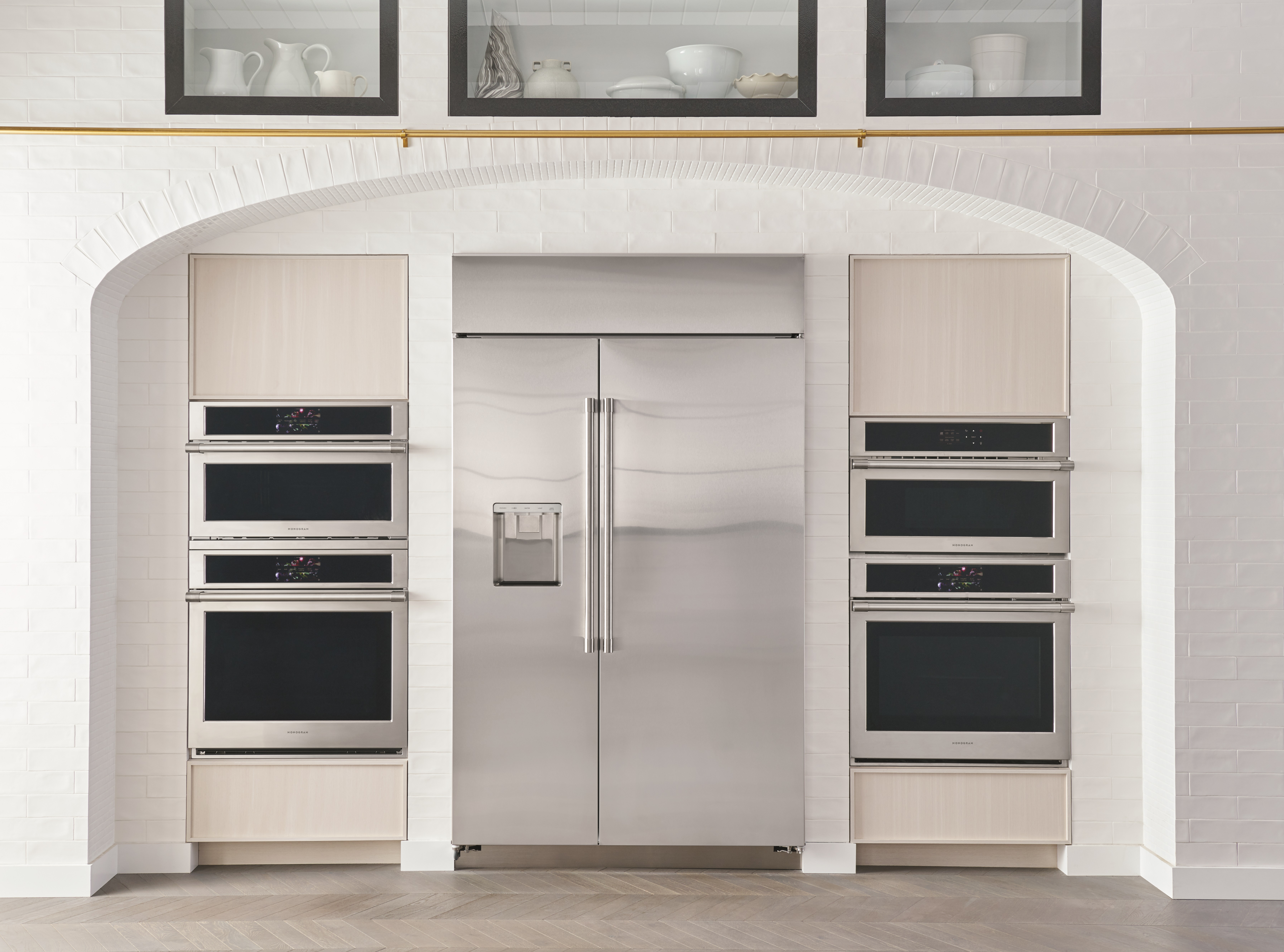 Front view of kitchen featuring Monogram built-in refrigerator 