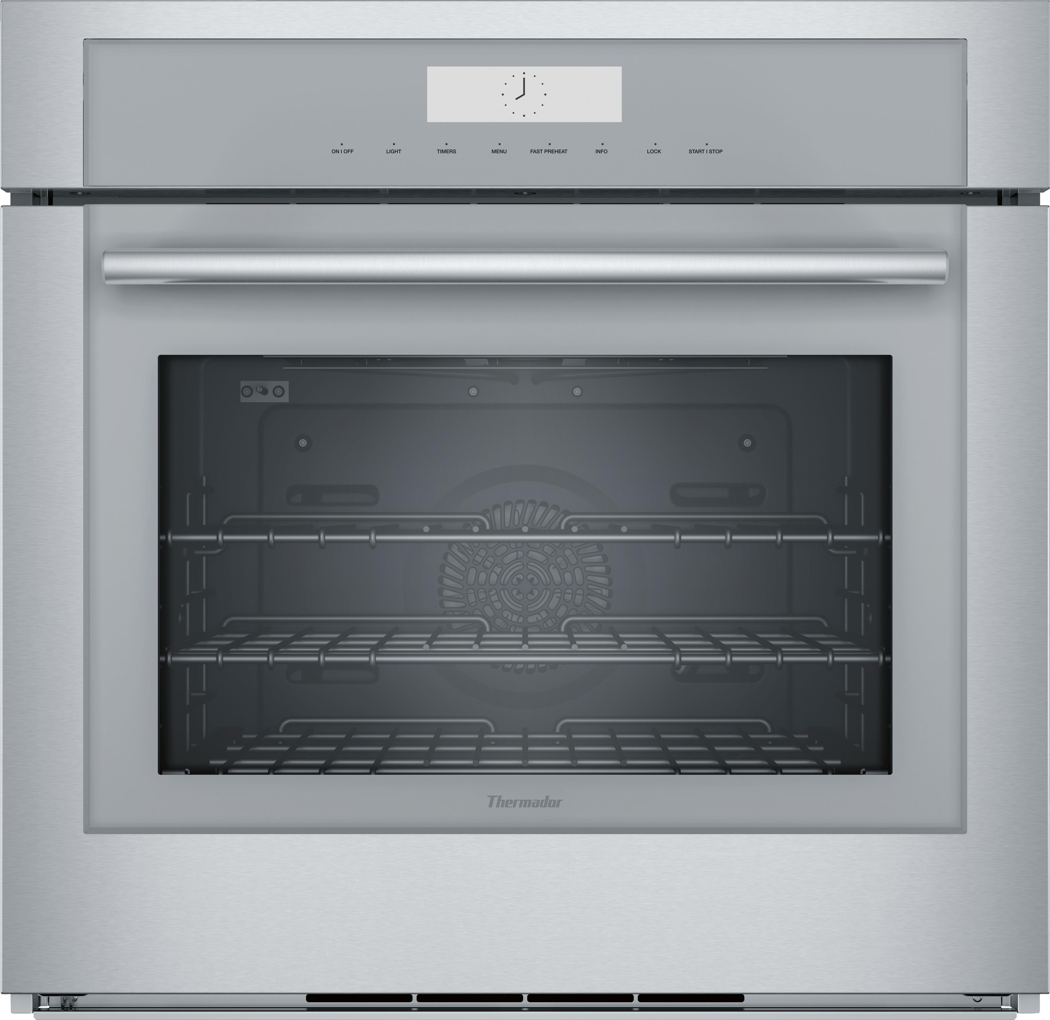 Stock photo of a stainless steel Thermador electric built in oven. 