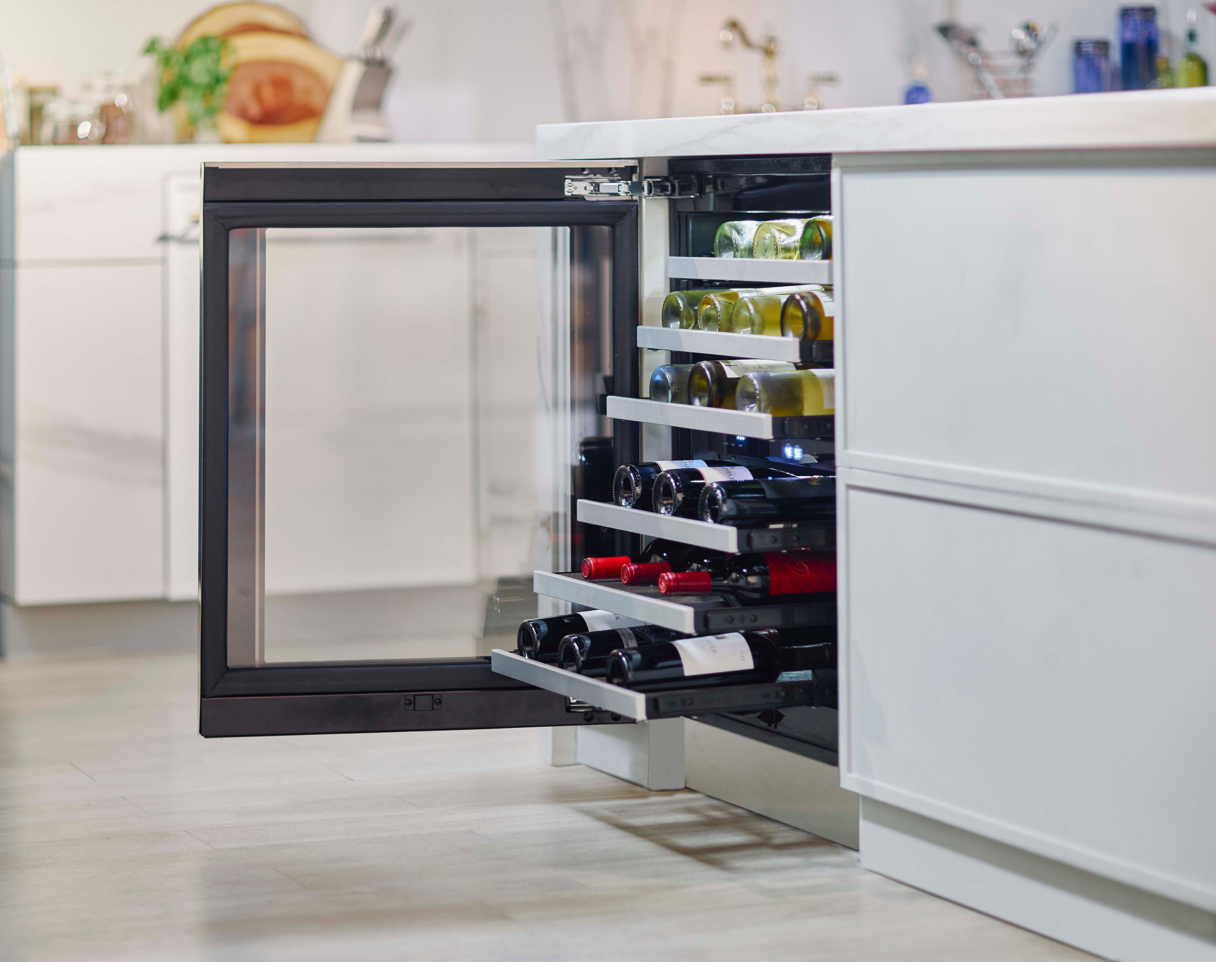 wine racks pulled out of under-counter Thermador wine cooler