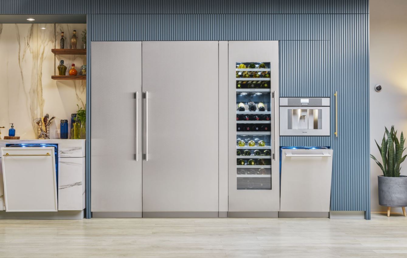 Built-in Thermador fridge, dishwasher, coffee maker, and wine cellar