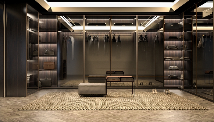 A luxurious walk-in closet with several stages of smart lighting