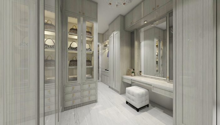 A luxury walk-in wardrobe with smart mirror over the large built-in vanity
