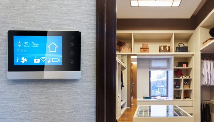 A smart panel featuring a smart lock for a walk-in closet