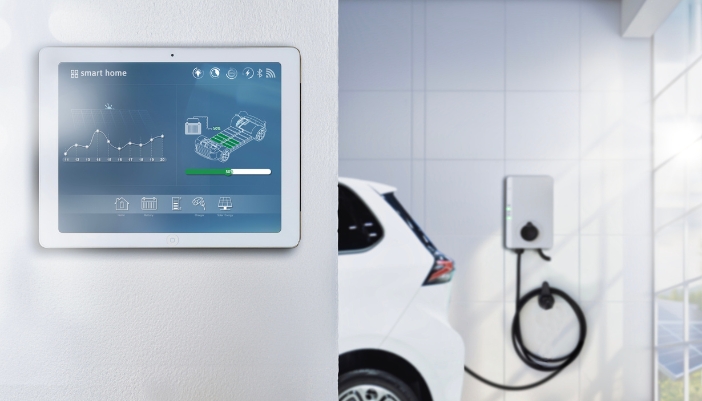 Closeup of smart panel outside of a garage with a built-in EV charging station