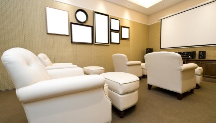 Contemporary home theater room with speakers in the front