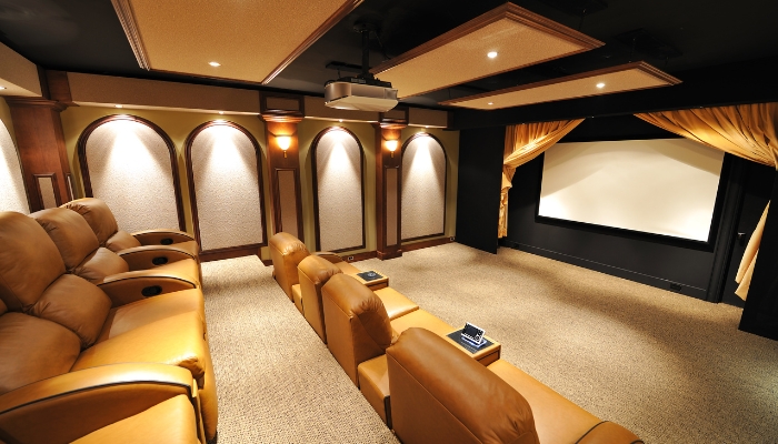 Home theater with in-ceiling lights and sconces