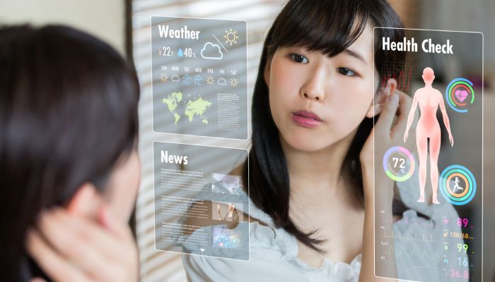 Woman seeing weather notifications on smart mirror