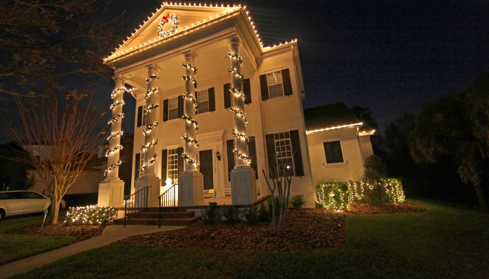 Themed Christmas lighting around colonial home