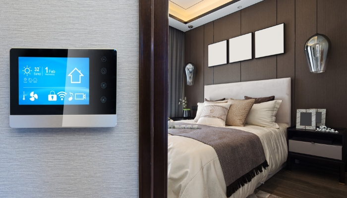 Smart control panel outside of bedroom showcasing temperature