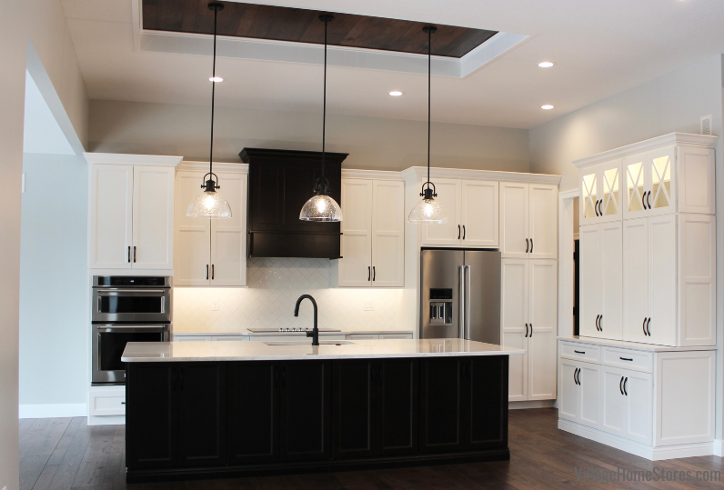 photo of great room kitchen with tray ceiling and lighting.