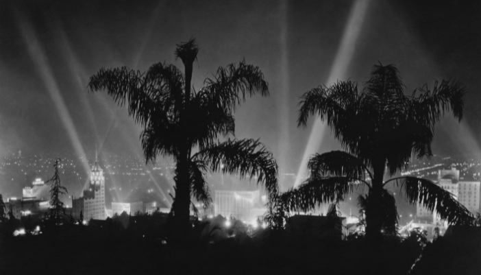 Vintage photo of old school Hollywood with searchlights going around