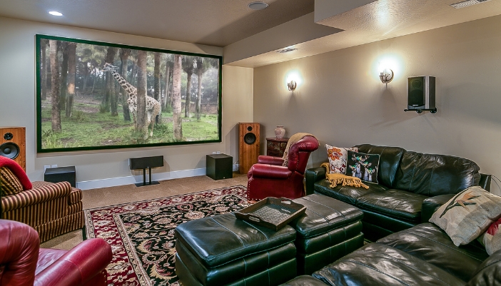 Home theater with large screen and surround sound and comfy seating