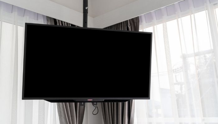 tv mounted on a ceiling mount