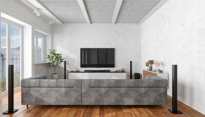 living room interior with smart tv, soundbar and sofa