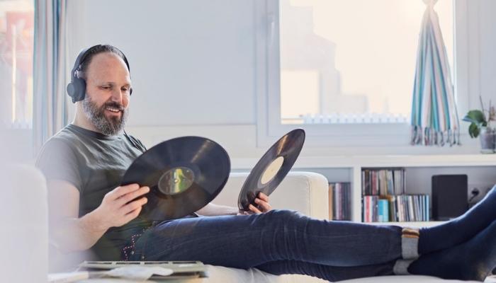 man listening to his vinyl's