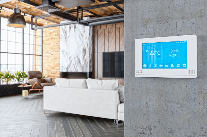 Interior of a modern luxury house with smart climate automation system.