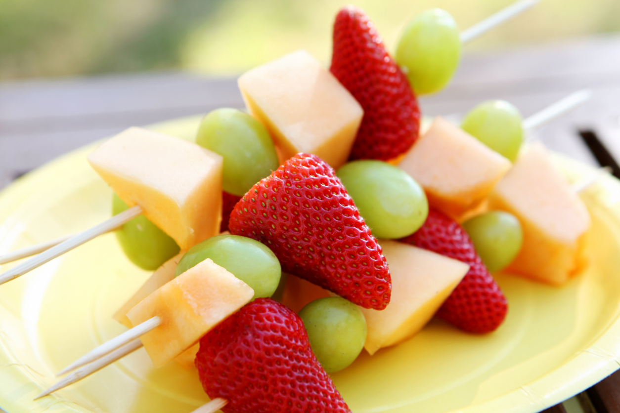 fruit kebabs with grapes, melons, and strawberries