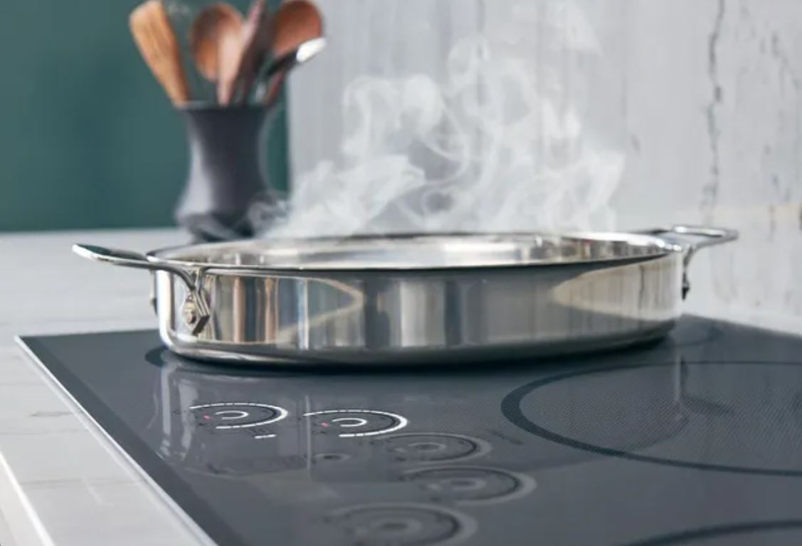 pan steaming on an induction cooktop