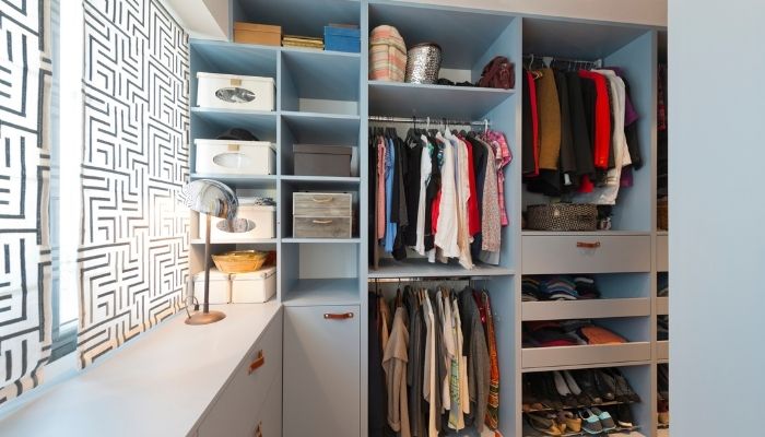 walk in closet with a closet system