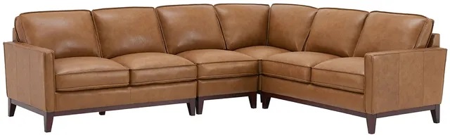Stock photo of a brown leather sectional sofa from Leather Italia.
