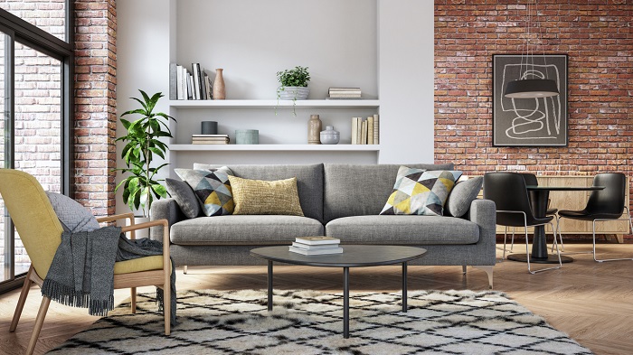 Modern living room with brick walls and contemporary furniture.