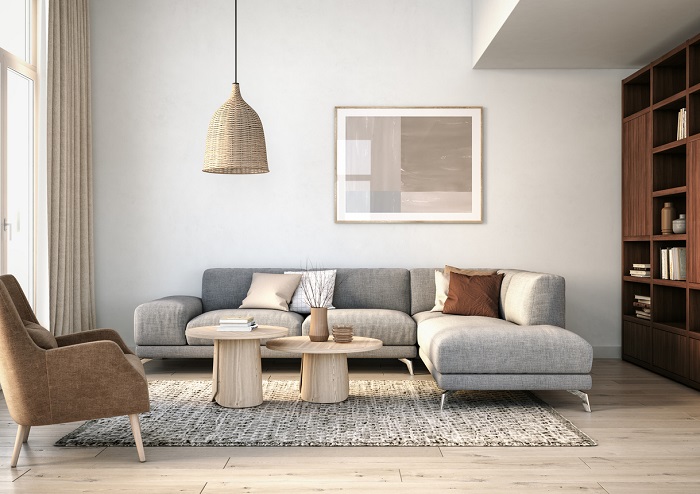 Scandinavian interior designed living room with gray and beige colored living room seating furniture.
